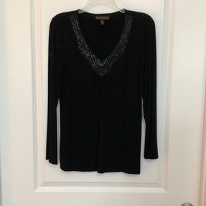 Black rayon dressy top. 27 inches-length. Worn once. Like new.